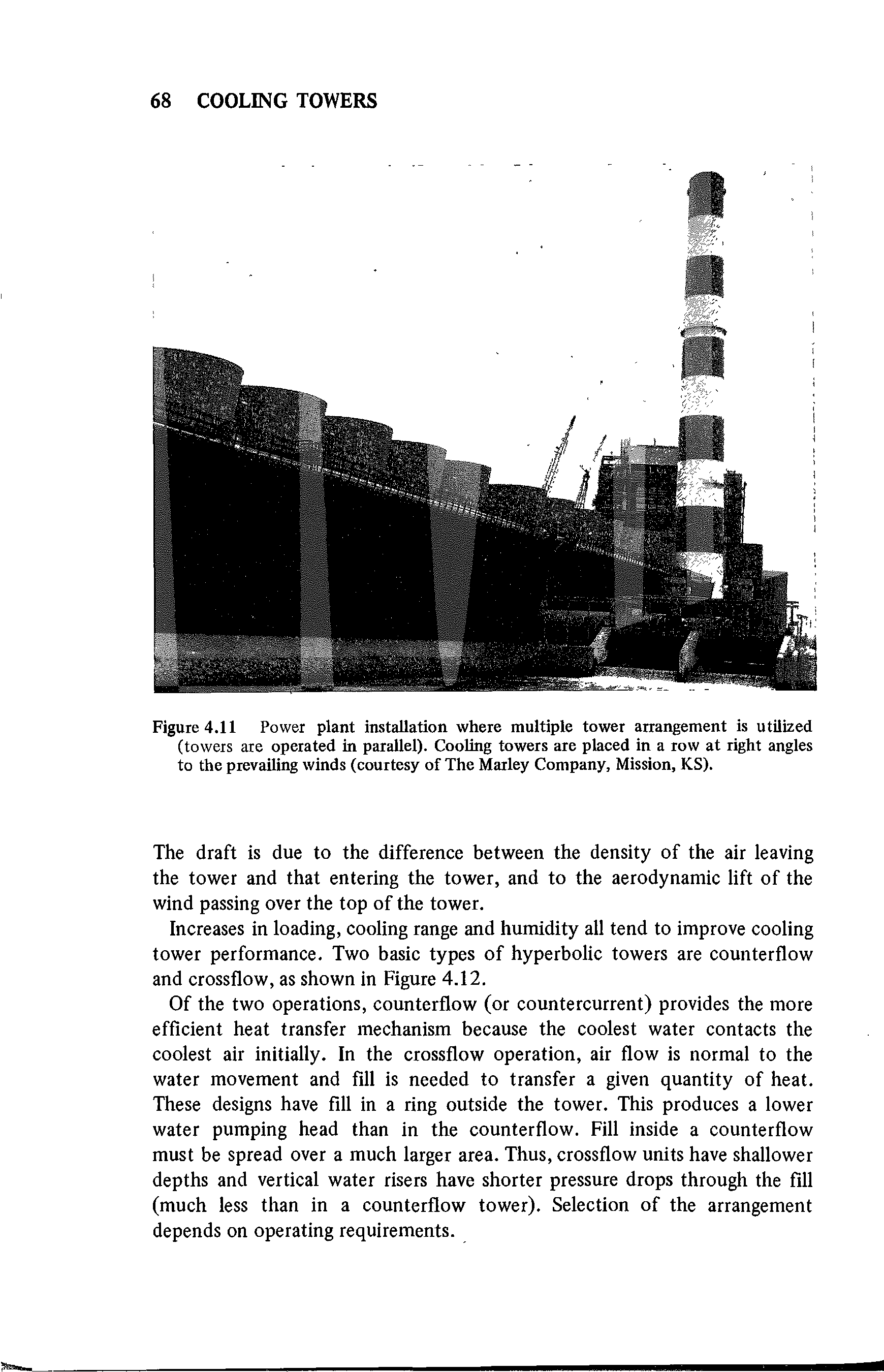 Figure 4.11 Power plant installation where multiple tower arrangement is utilized (towers ate operated in parallel). Cooling towers are placed in a row at right angles to the prevailing winds (courtesy of The Marley Company, Mission, KS).