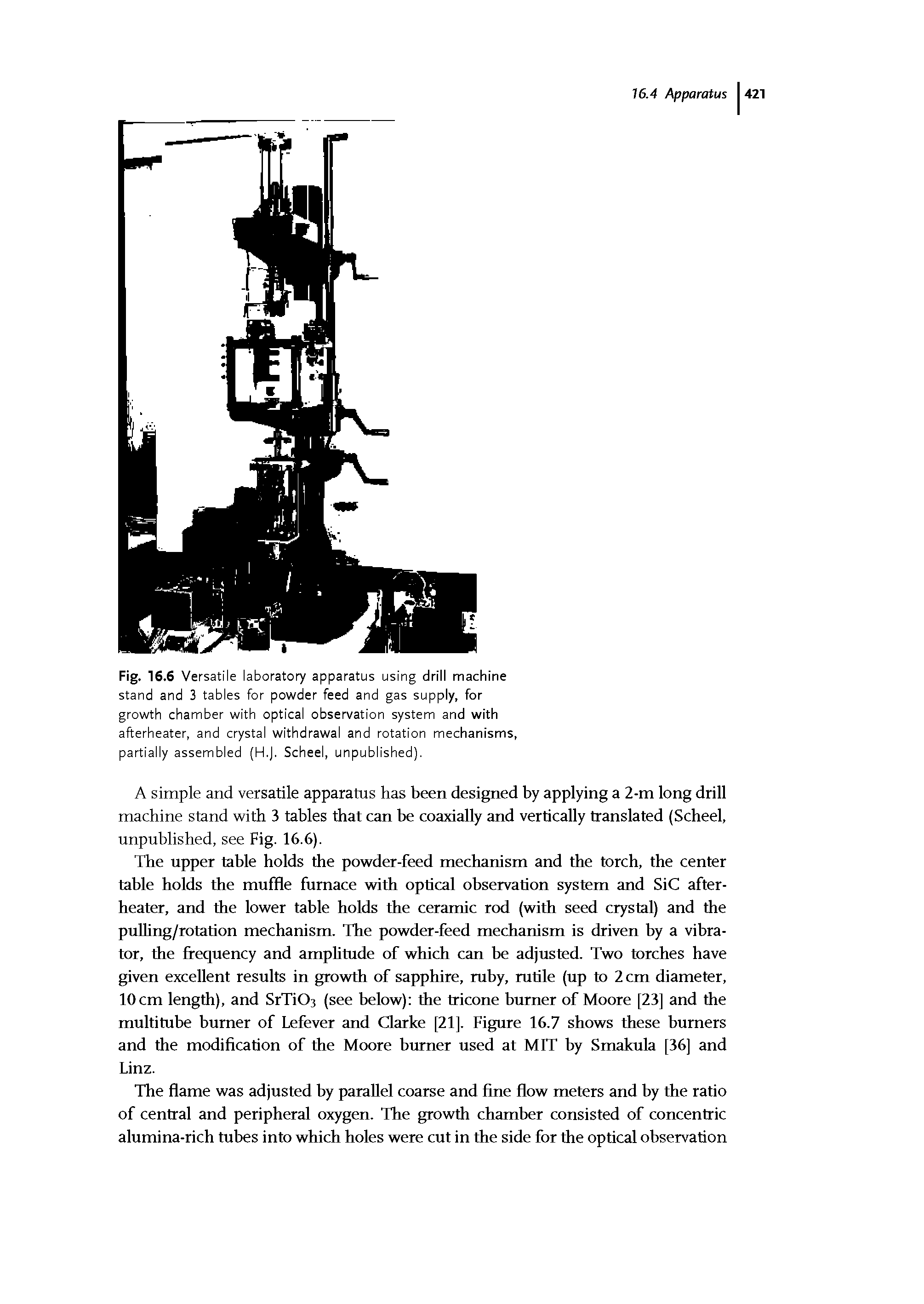 Fig. 16.6 Versatile laboratory apparatus using driii machine stand and 3 tables for powder feed and gas suppiy, for growth chamber with optical observation system and with afterheater, and crystal withdrawal and rotation mechanisms, partially assembled (H.J. Scheel, unpublished).