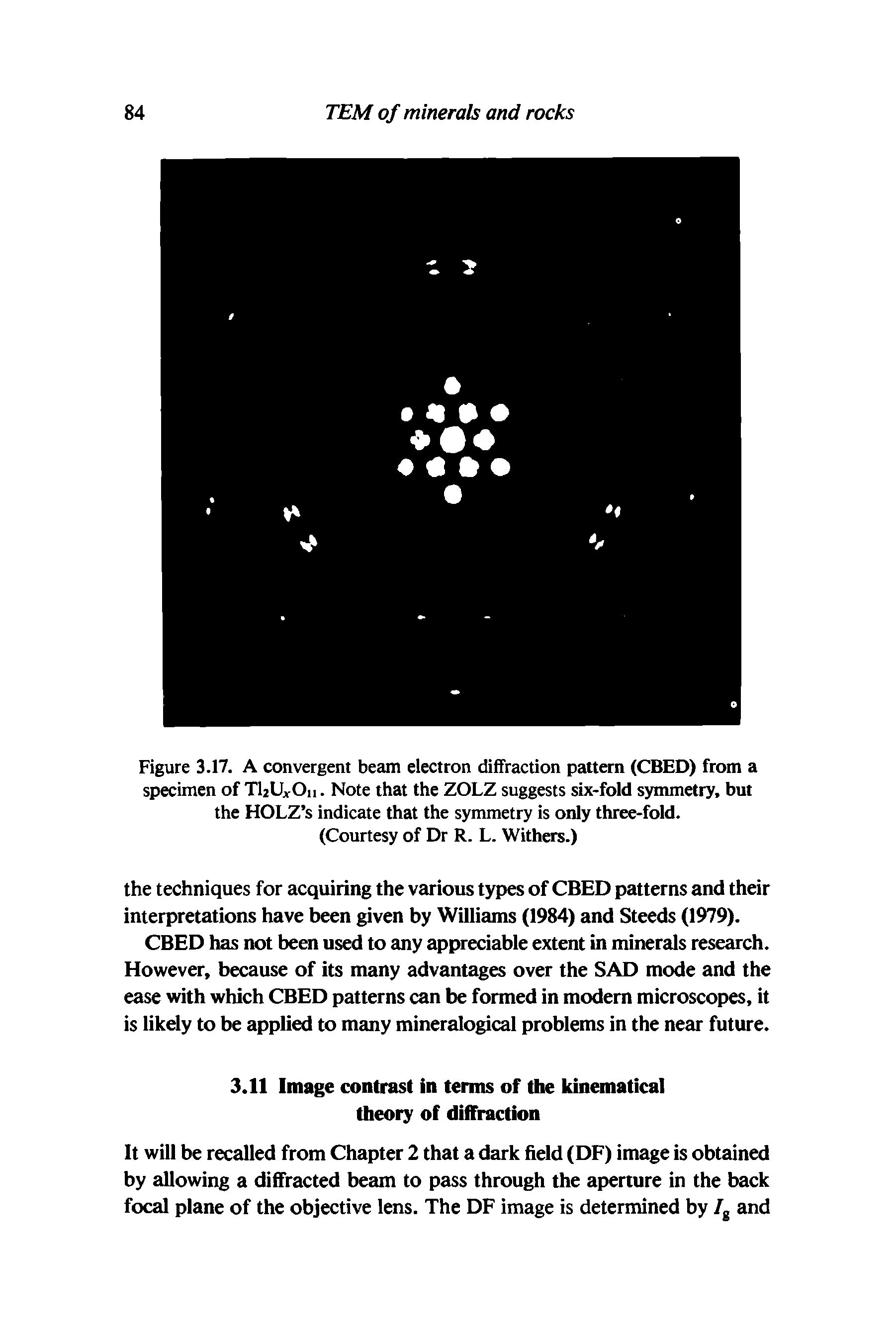 Figure 3.17. A convergent beam electron diffraction pattern (CBED) from a specimen of TUHrOn. Note that the ZOLZ suggests six-fold symmetry, but the HOLZ s indicate that the symmetry is only three-fold.