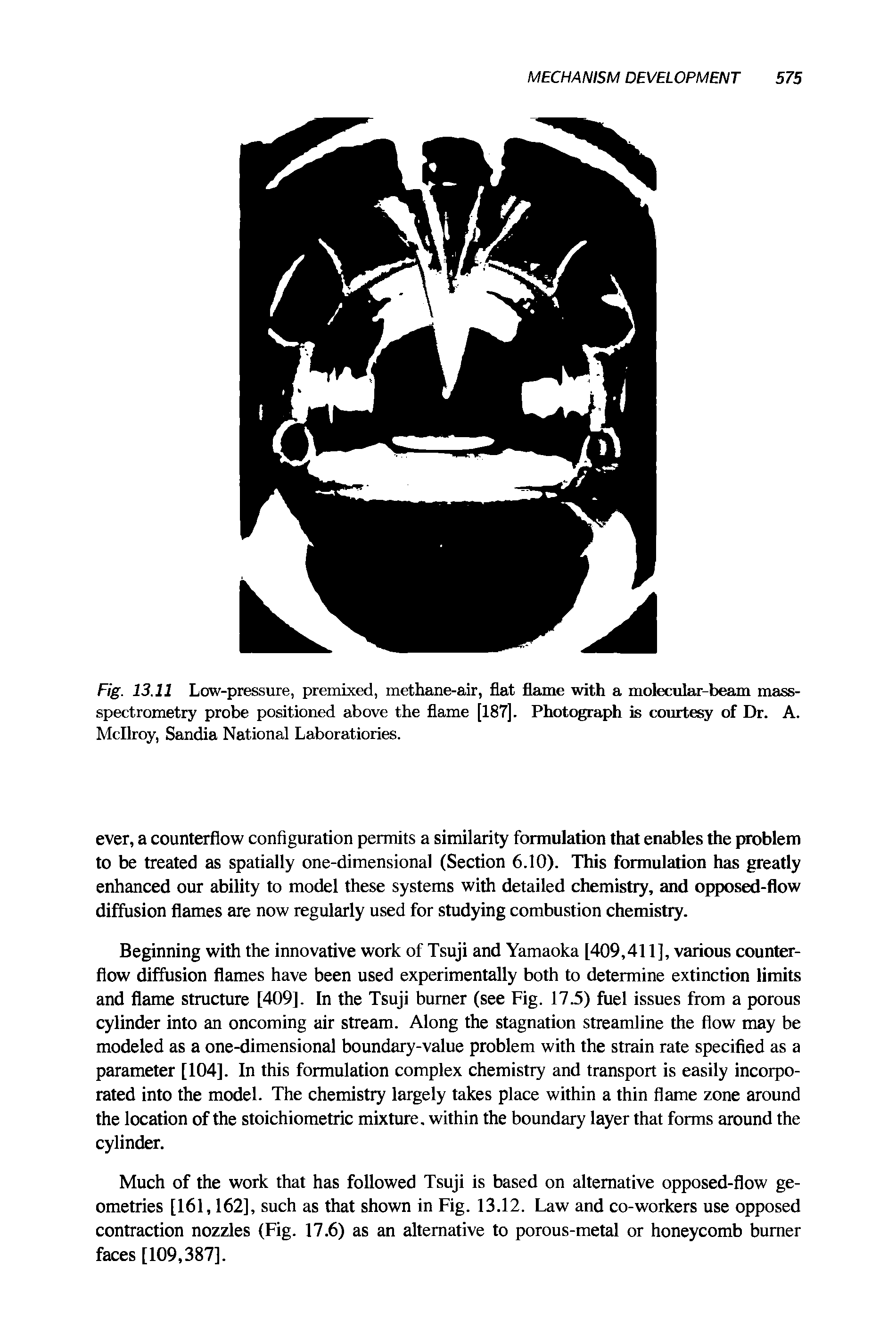 Fig. 13.11 Low-pressure, premixed, methane-air, flat flame with a molecular-beam mass-spectrometry probe positioned above the flame [187]. Photograph is courtesy of Dr. A. Mcllroy, Sandia National Laboratiories.