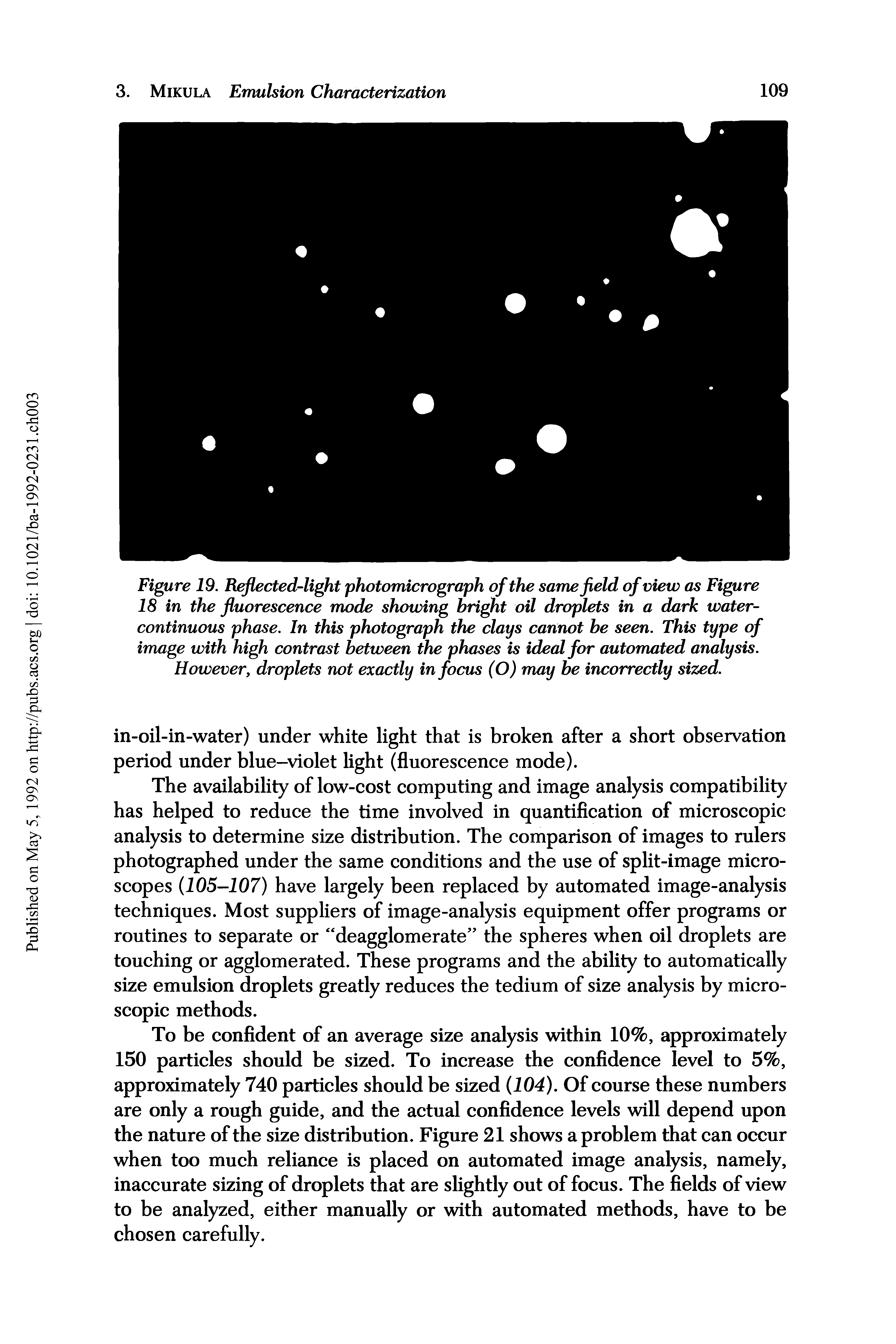 Figure 19. Reflected-light photomicrograph of the same field of view as Figure 18 in the fluorescence mode showing bright oil droplets in a dark water-continuous phase. In this photograph the clays cannot he seen. This type of image with high contrast between the phases is ideal for automated analysis. However, droplets not exactly in focus (O) may be incorrectly sized.