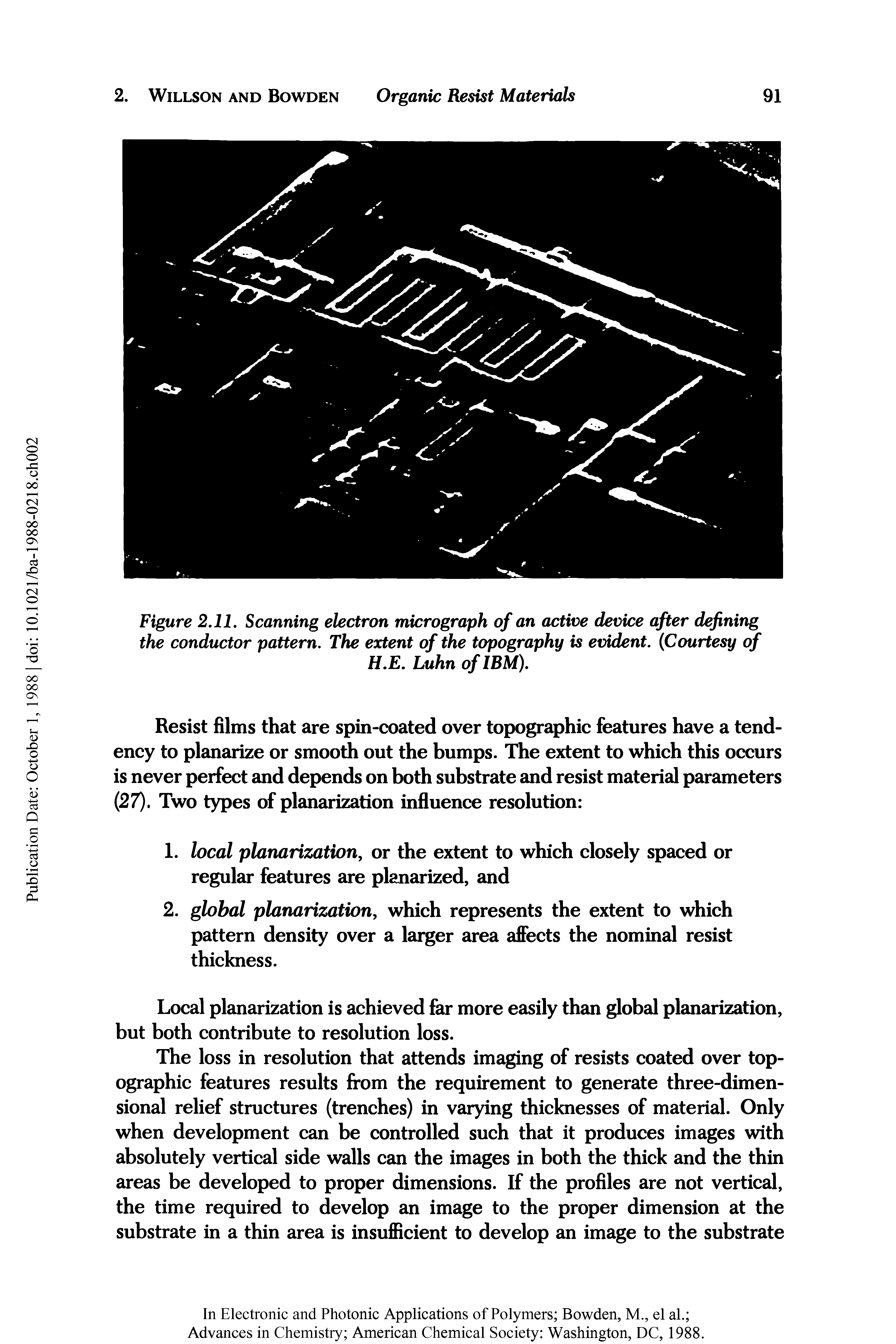 Figure 2.11. Scanning electron micrograph of an active device after defining the conductor pattern. The extent of the topography is evident. Courtesy of...