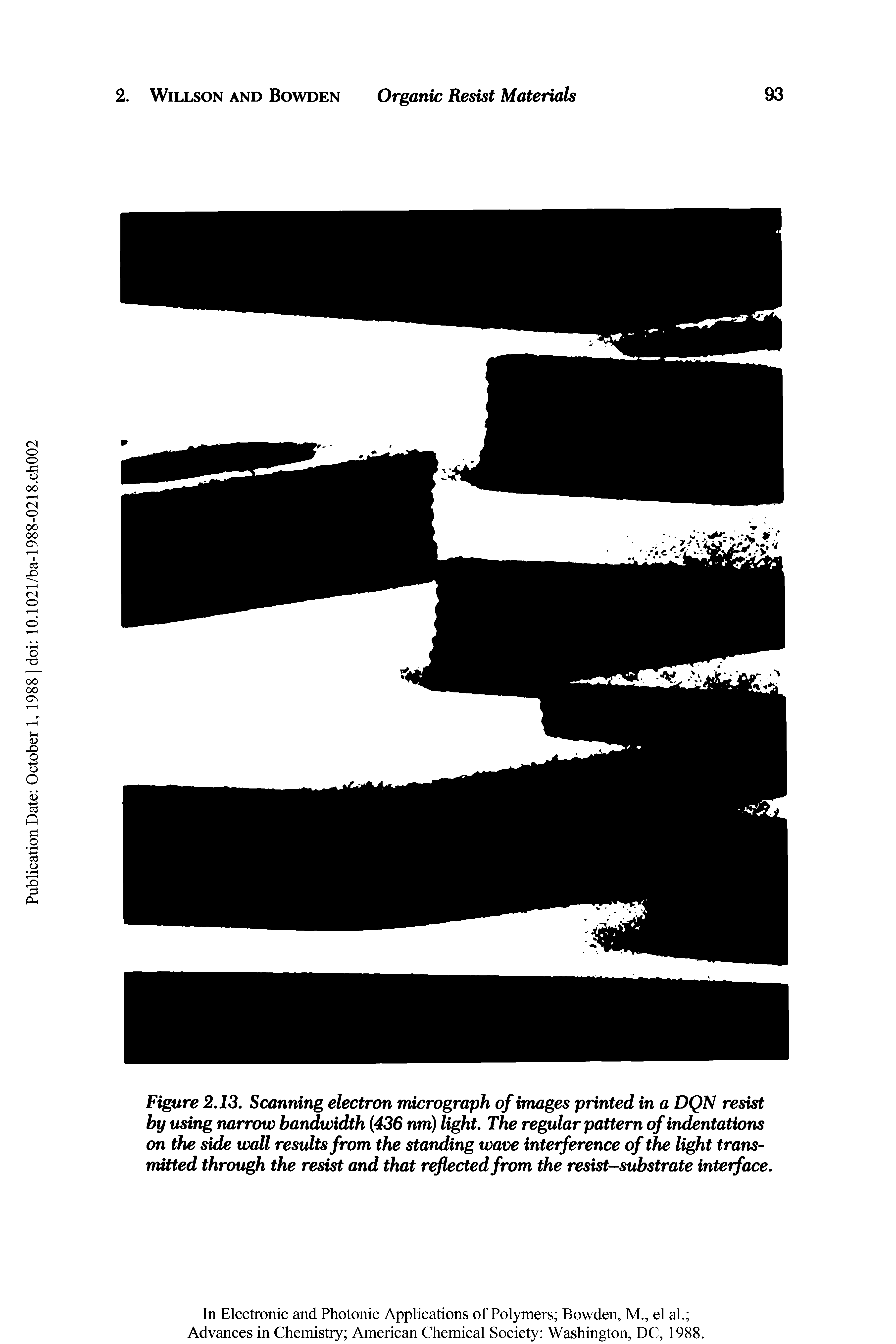 Figure 2.13. Scanning electron micrograph of images printed in a DQN resist by using narrow bandwidth 436 nm) light. The regular pattern of indentations on the side wall results from the standing wave interference of the light transmitted through the resist and that reflected from the resist-substrate interface.